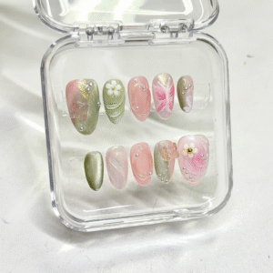 Green and pink floral press-on nails, almond shape – set of 10 in transparent case