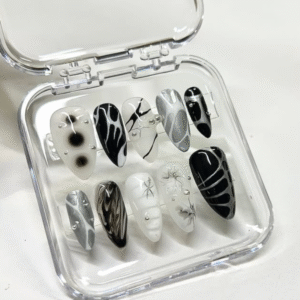 Black and white abstract press-on nails with leaf design, almond shape – set of 10 in transparent case